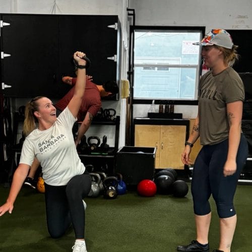 two girls with kettlebell